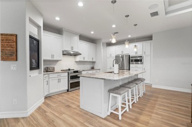 2023-built waterfront masterpiece in the highly sought-after on Saint Andrews South Golf Club in Florida - for sale on GolfHomes.com, golf home, golf lot