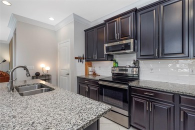 Discover effortless Florida living in your updated modern style on The Saints At Port St Lucie Golf Course in Florida - for sale on GolfHomes.com, golf home, golf lot