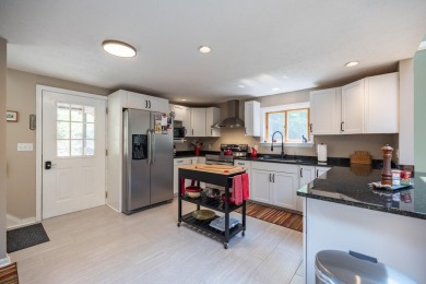 Discover the perfect blend of comfort, privacy, and convenience on Martindale Country Club in Maine - for sale on GolfHomes.com, golf home, golf lot