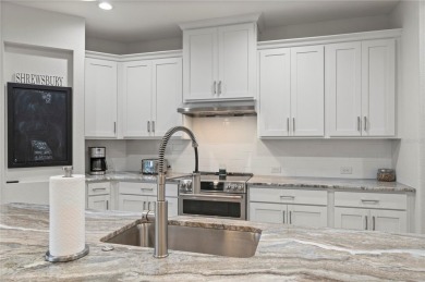 2023-built waterfront masterpiece in the highly sought-after on Saint Andrews South Golf Club in Florida - for sale on GolfHomes.com, golf home, golf lot