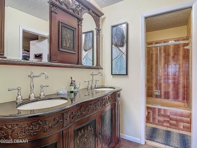 This 3 bedroom 2 bath end corner unit is nestled on the top on Indigo Lakes Golf Club in Florida - for sale on GolfHomes.com, golf home, golf lot