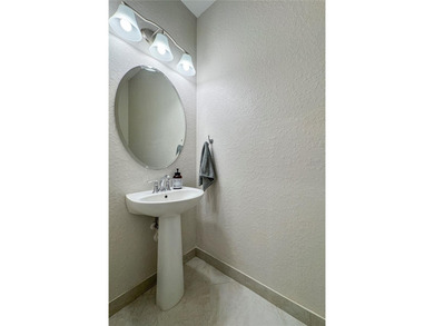 Discover effortless Florida living in your updated modern style on The Saints At Port St Lucie Golf Course in Florida - for sale on GolfHomes.com, golf home, golf lot