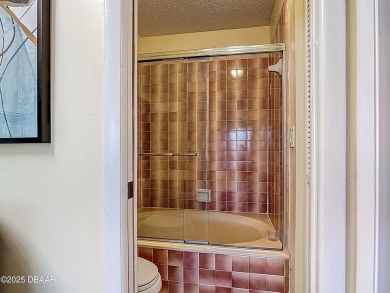 This 3 bedroom 2 bath end corner unit is nestled on the top on Indigo Lakes Golf Club in Florida - for sale on GolfHomes.com, golf home, golf lot