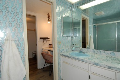 Welcome to this well-maintained 2-bedroom, 2-bathroom condo on Palm-Aire Country Club and Resort - The Oaks in Florida - for sale on GolfHomes.com, golf home, golf lot