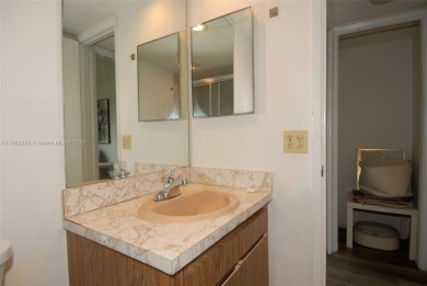 Welcome to this well-maintained 2-bedroom, 2-bathroom condo on Palm-Aire Country Club and Resort - The Oaks in Florida - for sale on GolfHomes.com, golf home, golf lot
