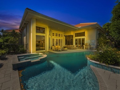 THIS GRACIOUS CUSTOM HOME HAS A GOLF MEMBERSHIP, GOLF AND LAKE on BallenIsles Golf and Country Club in Florida - for sale on GolfHomes.com, golf home, golf lot