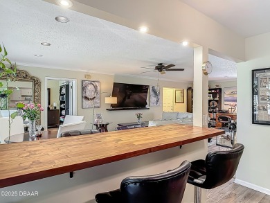 This 3 bedroom 2 bath end corner unit is nestled on the top on Indigo Lakes Golf Club in Florida - for sale on GolfHomes.com, golf home, golf lot