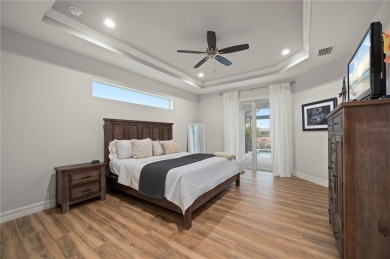 2023-built waterfront masterpiece in the highly sought-after on Saint Andrews South Golf Club in Florida - for sale on GolfHomes.com, golf home, golf lot