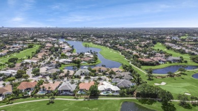THIS GRACIOUS CUSTOM HOME HAS A GOLF MEMBERSHIP, GOLF AND LAKE on BallenIsles Golf and Country Club in Florida - for sale on GolfHomes.com, golf home, golf lot