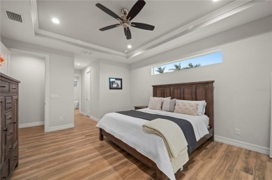 2023-built waterfront masterpiece in the highly sought-after on Saint Andrews South Golf Club in Florida - for sale on GolfHomes.com, golf home, golf lot