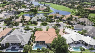 THIS GRACIOUS CUSTOM HOME HAS A GOLF MEMBERSHIP, GOLF AND LAKE on BallenIsles Golf and Country Club in Florida - for sale on GolfHomes.com, golf home, golf lot