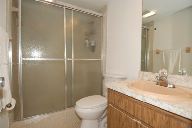 Welcome to this well-maintained 2-bedroom, 2-bathroom condo on Palm-Aire Country Club and Resort - The Oaks in Florida - for sale on GolfHomes.com, golf home, golf lot