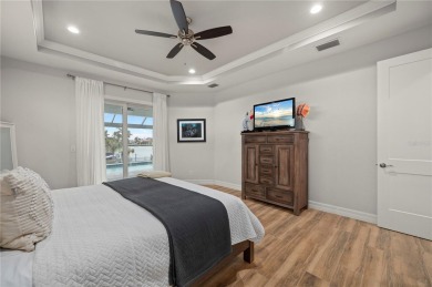 2023-built waterfront masterpiece in the highly sought-after on Saint Andrews South Golf Club in Florida - for sale on GolfHomes.com, golf home, golf lot