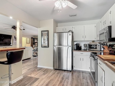 This 3 bedroom 2 bath end corner unit is nestled on the top on Indigo Lakes Golf Club in Florida - for sale on GolfHomes.com, golf home, golf lot