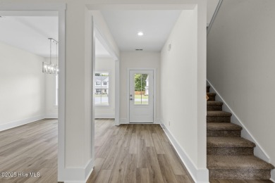 Beautiful new construction home located on the 8th hole of Rock on Rock Creek Country Club in North Carolina - for sale on GolfHomes.com, golf home, golf lot