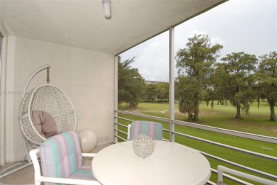 Welcome to this well-maintained 2-bedroom, 2-bathroom condo on Palm-Aire Country Club and Resort - The Oaks in Florida - for sale on GolfHomes.com, golf home, golf lot