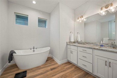 2023-built waterfront masterpiece in the highly sought-after on Saint Andrews South Golf Club in Florida - for sale on GolfHomes.com, golf home, golf lot
