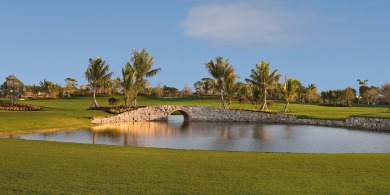 THIS GRACIOUS CUSTOM HOME HAS A GOLF MEMBERSHIP, GOLF AND LAKE on BallenIsles Golf and Country Club in Florida - for sale on GolfHomes.com, golf home, golf lot