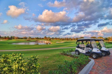 THIS GRACIOUS CUSTOM HOME HAS A GOLF MEMBERSHIP, GOLF AND LAKE on BallenIsles Golf and Country Club in Florida - for sale on GolfHomes.com, golf home, golf lot