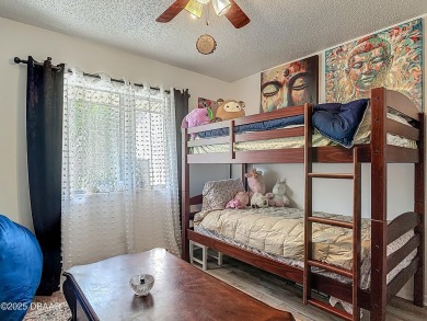 This 3 bedroom 2 bath end corner unit is nestled on the top on Indigo Lakes Golf Club in Florida - for sale on GolfHomes.com, golf home, golf lot