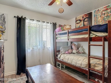 This 3 bedroom 2 bath end corner unit is nestled on the top on Indigo Lakes Golf Club in Florida - for sale on GolfHomes.com, golf home, golf lot