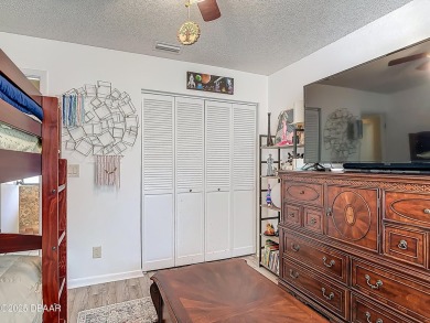 This 3 bedroom 2 bath end corner unit is nestled on the top on Indigo Lakes Golf Club in Florida - for sale on GolfHomes.com, golf home, golf lot