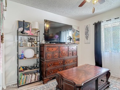 This 3 bedroom 2 bath end corner unit is nestled on the top on Indigo Lakes Golf Club in Florida - for sale on GolfHomes.com, golf home, golf lot
