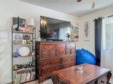 This 3 bedroom 2 bath end corner unit is nestled on the top on Indigo Lakes Golf Club in Florida - for sale on GolfHomes.com, golf home, golf lot