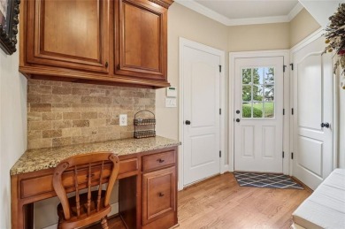 This exquisite Traditional Craftsman home rests near the end of on Traditions of Braselton Golf Club in Georgia - for sale on GolfHomes.com, golf home, golf lot