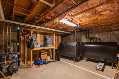 Discover the perfect blend of comfort, privacy, and convenience on Martindale Country Club in Maine - for sale on GolfHomes.com, golf home, golf lot