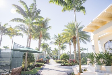 THIS GRACIOUS CUSTOM HOME HAS A GOLF MEMBERSHIP, GOLF AND LAKE on BallenIsles Golf and Country Club in Florida - for sale on GolfHomes.com, golf home, golf lot