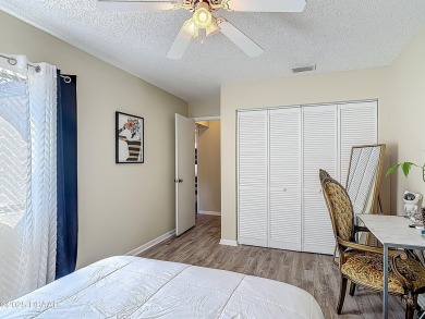 This 3 bedroom 2 bath end corner unit is nestled on the top on Indigo Lakes Golf Club in Florida - for sale on GolfHomes.com, golf home, golf lot