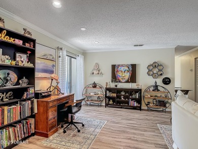 This 3 bedroom 2 bath end corner unit is nestled on the top on Indigo Lakes Golf Club in Florida - for sale on GolfHomes.com, golf home, golf lot