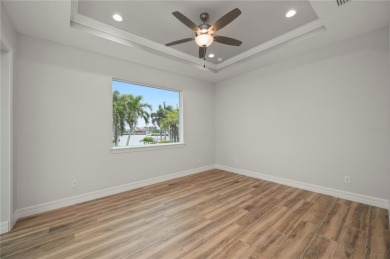 2023-built waterfront masterpiece in the highly sought-after on Saint Andrews South Golf Club in Florida - for sale on GolfHomes.com, golf home, golf lot