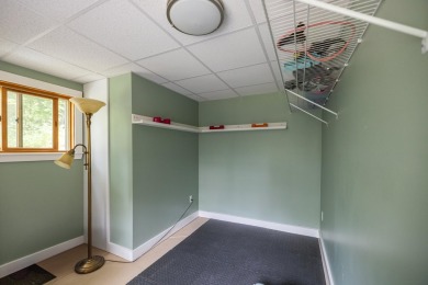 Discover the perfect blend of comfort, privacy, and convenience on Martindale Country Club in Maine - for sale on GolfHomes.com, golf home, golf lot