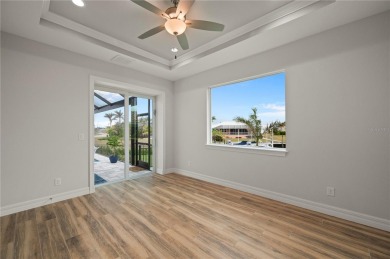 2023-built waterfront masterpiece in the highly sought-after on Saint Andrews South Golf Club in Florida - for sale on GolfHomes.com, golf home, golf lot