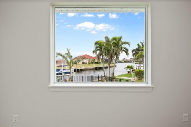 2023-built waterfront masterpiece in the highly sought-after on Saint Andrews South Golf Club in Florida - for sale on GolfHomes.com, golf home, golf lot