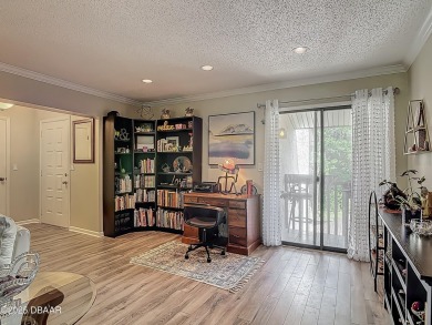 This 3 bedroom 2 bath end corner unit is nestled on the top on Indigo Lakes Golf Club in Florida - for sale on GolfHomes.com, golf home, golf lot
