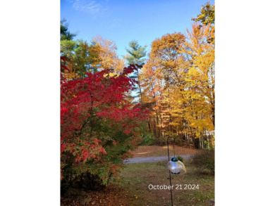 Discover the perfect blend of comfort, privacy, and convenience on Martindale Country Club in Maine - for sale on GolfHomes.com, golf home, golf lot