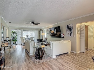 This 3 bedroom 2 bath end corner unit is nestled on the top on Indigo Lakes Golf Club in Florida - for sale on GolfHomes.com, golf home, golf lot