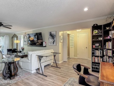 This 3 bedroom 2 bath end corner unit is nestled on the top on Indigo Lakes Golf Club in Florida - for sale on GolfHomes.com, golf home, golf lot