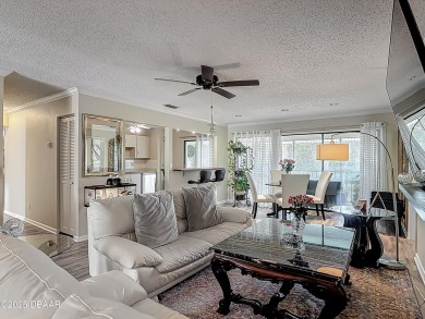 This 3 bedroom 2 bath end corner unit is nestled on the top on Indigo Lakes Golf Club in Florida - for sale on GolfHomes.com, golf home, golf lot