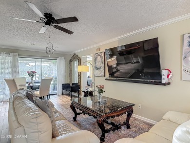 This 3 bedroom 2 bath end corner unit is nestled on the top on Indigo Lakes Golf Club in Florida - for sale on GolfHomes.com, golf home, golf lot