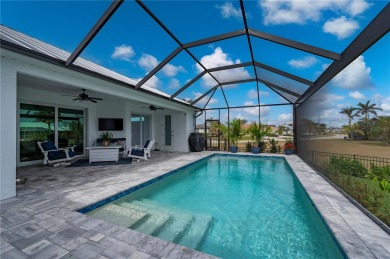 2023-built waterfront masterpiece in the highly sought-after on Saint Andrews South Golf Club in Florida - for sale on GolfHomes.com, golf home, golf lot