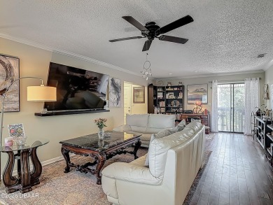 This 3 bedroom 2 bath end corner unit is nestled on the top on Indigo Lakes Golf Club in Florida - for sale on GolfHomes.com, golf home, golf lot