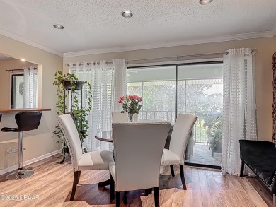This 3 bedroom 2 bath end corner unit is nestled on the top on Indigo Lakes Golf Club in Florida - for sale on GolfHomes.com, golf home, golf lot