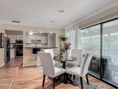 This 3 bedroom 2 bath end corner unit is nestled on the top on Indigo Lakes Golf Club in Florida - for sale on GolfHomes.com, golf home, golf lot