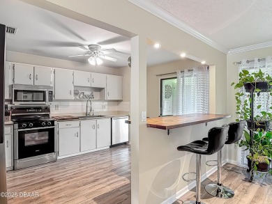This 3 bedroom 2 bath end corner unit is nestled on the top on Indigo Lakes Golf Club in Florida - for sale on GolfHomes.com, golf home, golf lot