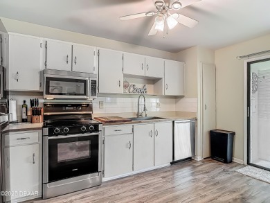 This 3 bedroom 2 bath end corner unit is nestled on the top on Indigo Lakes Golf Club in Florida - for sale on GolfHomes.com, golf home, golf lot