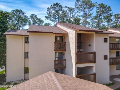 This 3 bedroom 2 bath end corner unit is nestled on the top on Indigo Lakes Golf Club in Florida - for sale on GolfHomes.com, golf home, golf lot